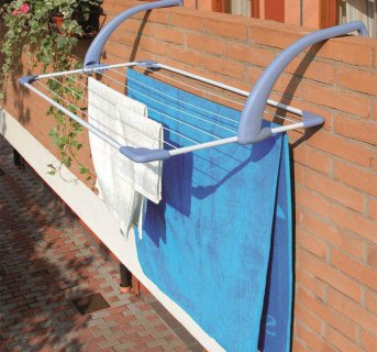 Hanging cloth dryer 10m.  Brezza 100 Gimi, White with blue bases resting in the garden